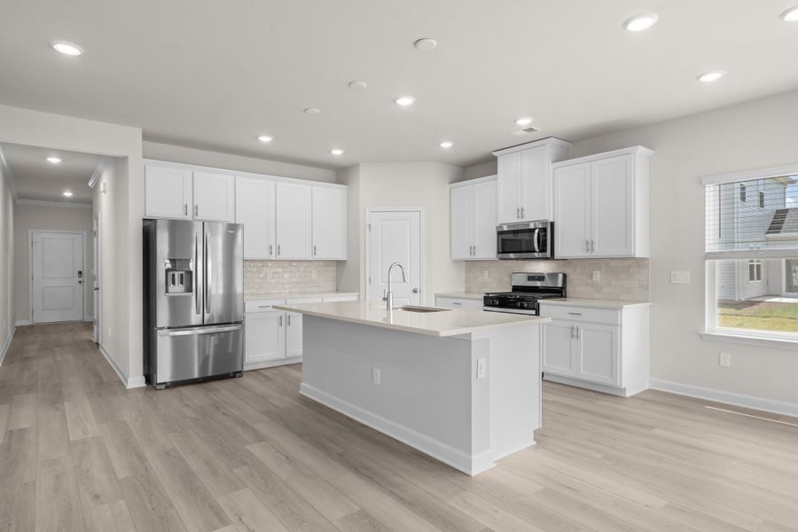 Furnished interior view inside a new home in Cypress Ridge - The Coastline Series, Longs (Image 4).