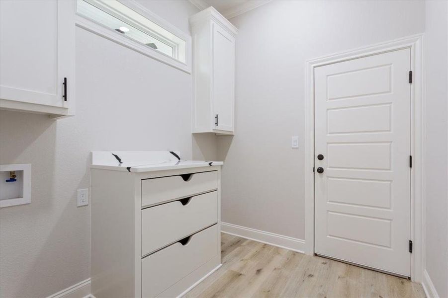 Utility room with built in cabinets Utility room with built in cabinets