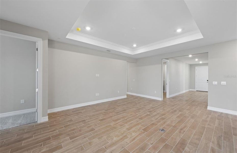 Spacious, unfurnished interior of a new home in The Strand at Cedar Grove, North Port (Image 31).
