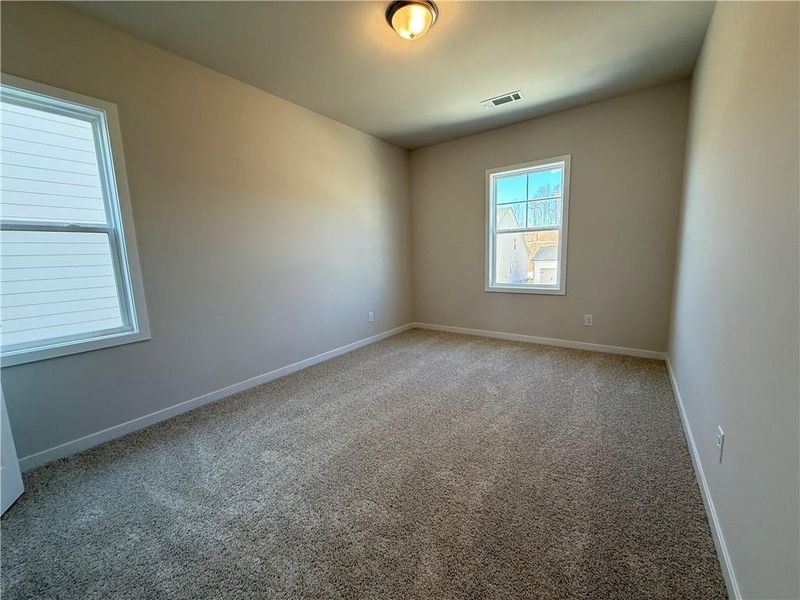 Spacious, unfurnished interior of a new home in Ponderosa Farms Manor, Gainesville (Image 26).