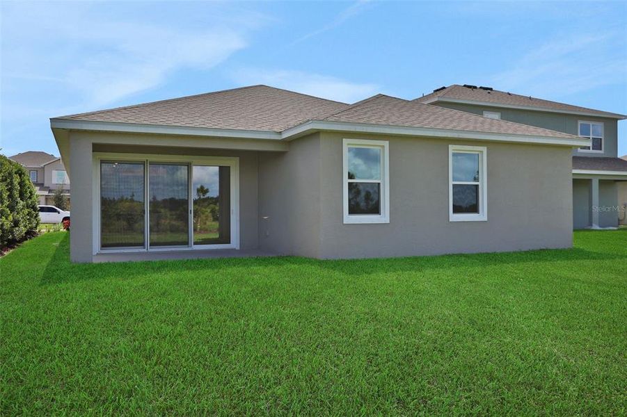 Exterior details and patio area of a home in Turnleaf, Punta Gorda (Image 2).