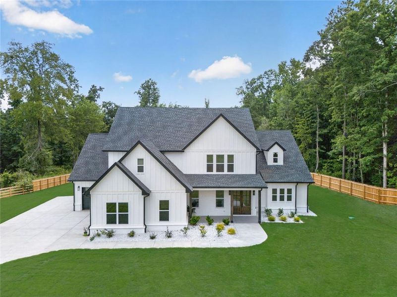 Front exterior of a new home in , Bethlehem, GA, highlighting curb appeal (Image 34).
