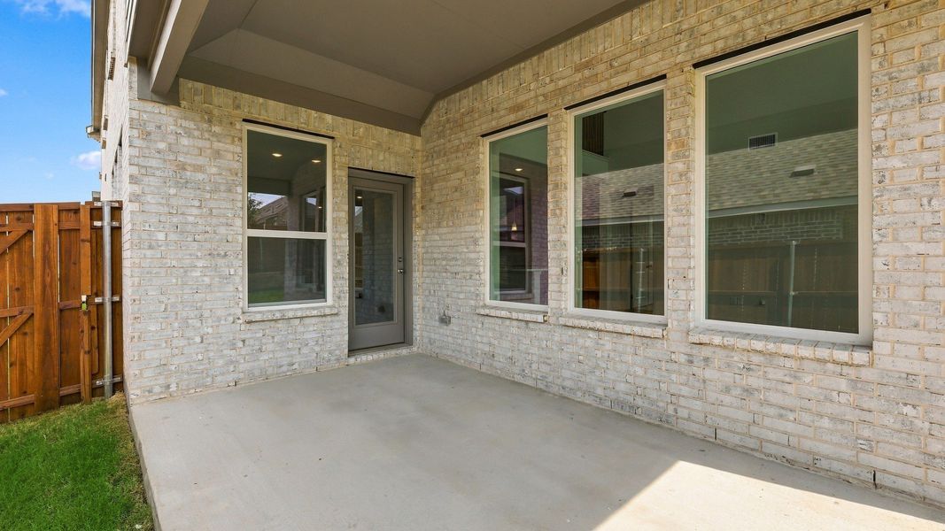 Exterior details and patio area of a home in Wildflower Ranch, Fort Worth (Image 2). Exterior details and patio area of a home in Wildflower Ranch, Fort Worth (Image 2).