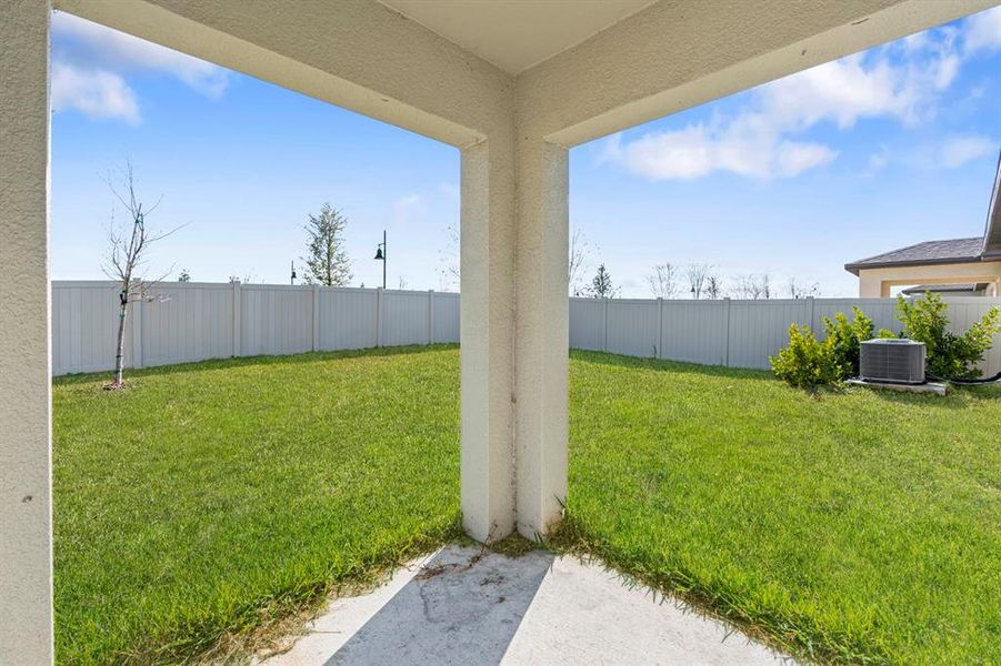 Exterior details and patio area of a home in North Park Isle: The Estates II, Plant City (Image 33). Exterior details and patio area of a home in North Park Isle: The Estates II, Plant City (Image 33).