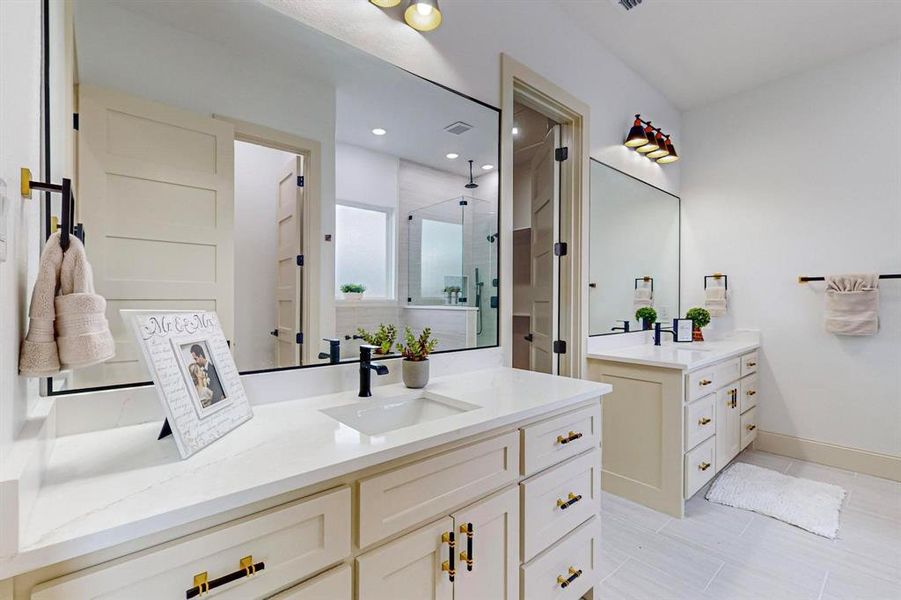 Bathroom with walk in shower and vanity