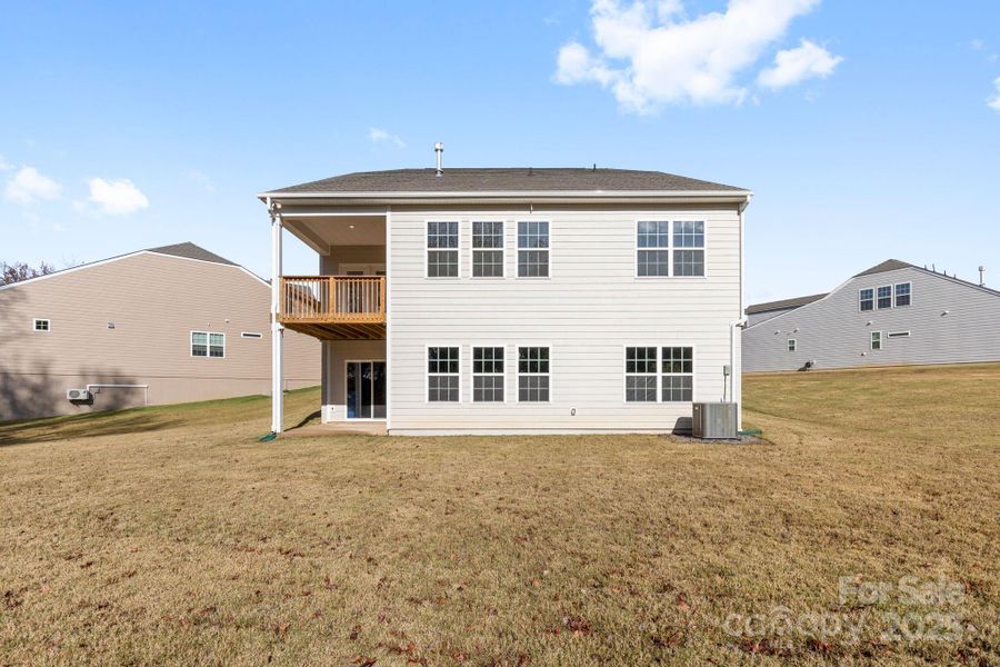 Exterior details and patio area of a home in Bell Farm: 60's, Statesville (Image 24).