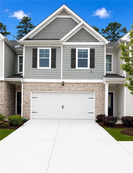 Front exterior of a new home in Creekside Village Phase II, Lithonia, GA, highlighting curb appeal (Image 1). Front exterior of a new home in Creekside Village Phase II, Lithonia, GA, highlighting curb appeal (Image 1).