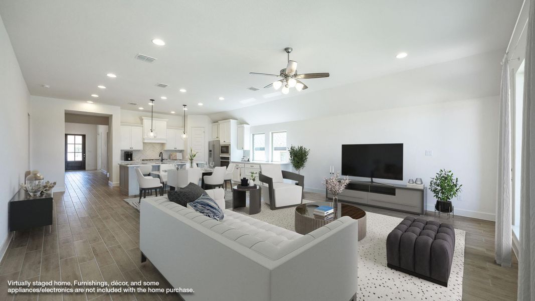 Living room featuring light wood finished floors, recessed lighting, and ceiling fan