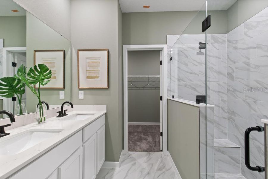 Photos are of a model home; any dimensions listed are approximate and may change. Home aspects and included items may vary and are not intended to form part of any contract or warranty.