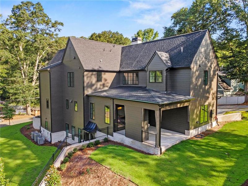 Front exterior of a new home in , Roswell, GA, highlighting curb appeal (Image 30). Front exterior of a new home in , Roswell, GA, highlighting curb appeal (Image 30).