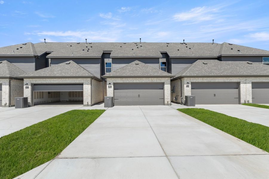 Front exterior of a new home in Creekshaw, Royse City, TX, highlighting curb appeal (Image 27).
