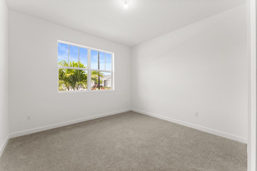 Spacious, unfurnished interior of a new home in Tradition - Cadence, Port St. Lucie (Image 9).