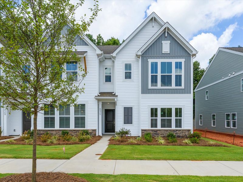 Front exterior of a new home in Westwood Reserve, Charlotte, NC, highlighting curb appeal (Image 23). Front exterior of a new home in Westwood Reserve, Charlotte, NC, highlighting curb appeal (Image 23).