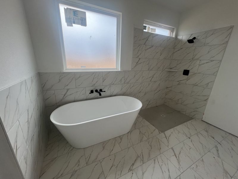 Furnished interior view inside a new home in Zion Valley, Poolville (Image 3).