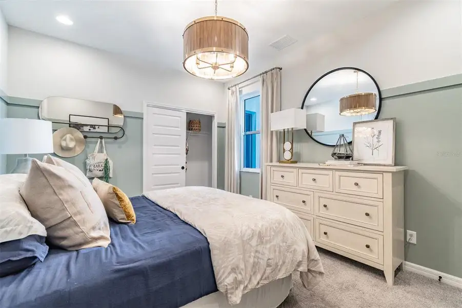 Furnished interior view inside a new home in Kings Gate, Port Charlotte (Image 7).