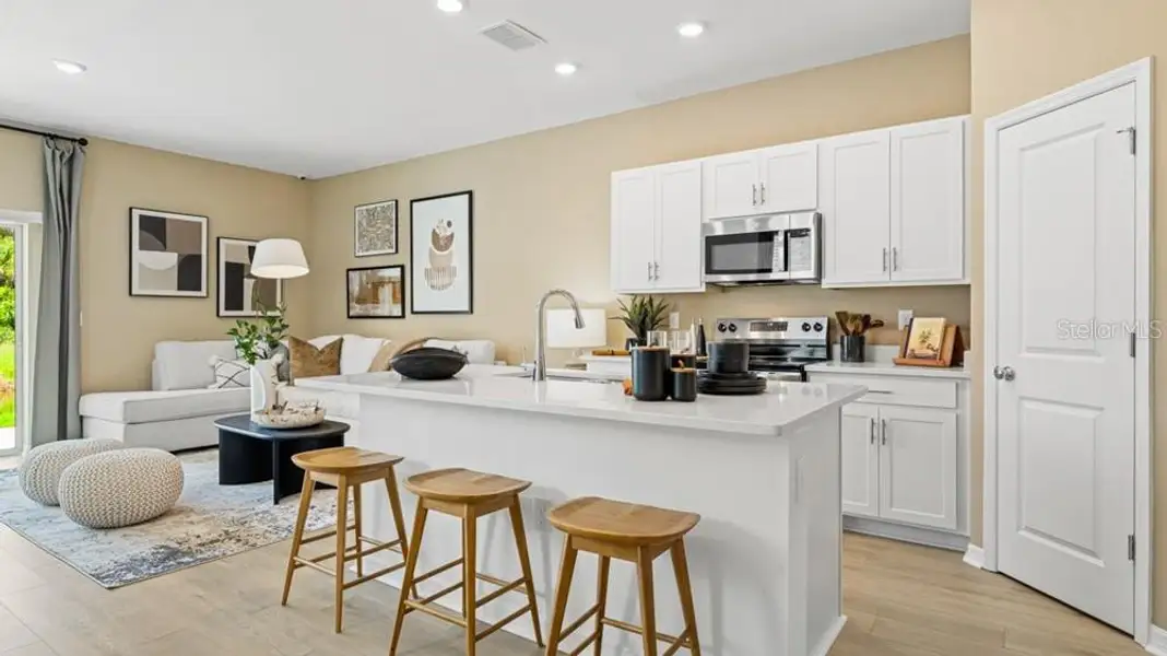 Furnished interior view inside a new home in The Towns at Tiburon, Nokomis (Image 9).