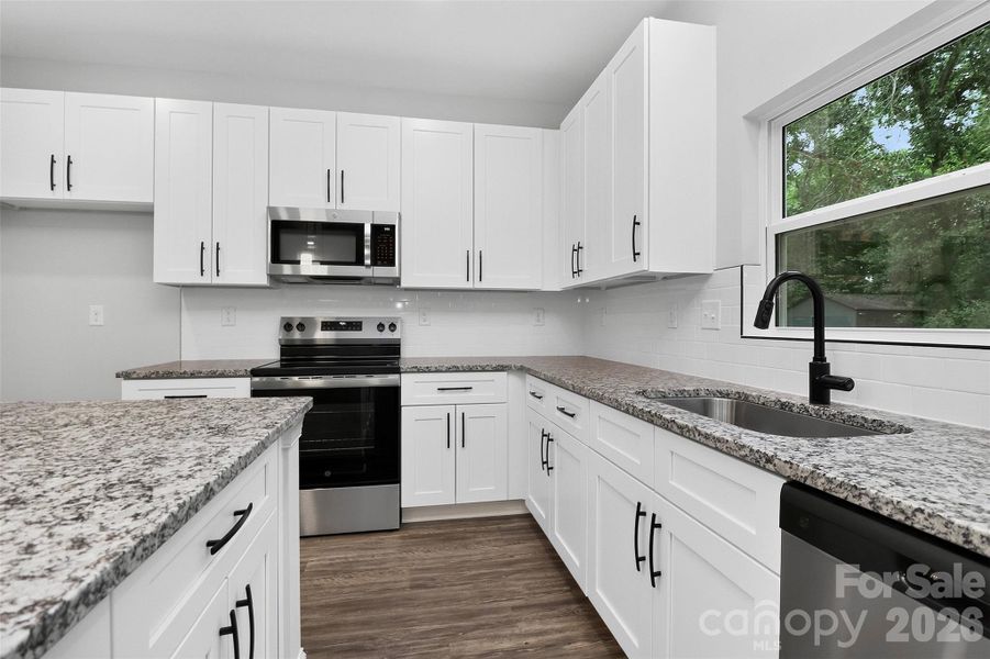 Furnished interior view inside a new home in , Belmont (Image 11).