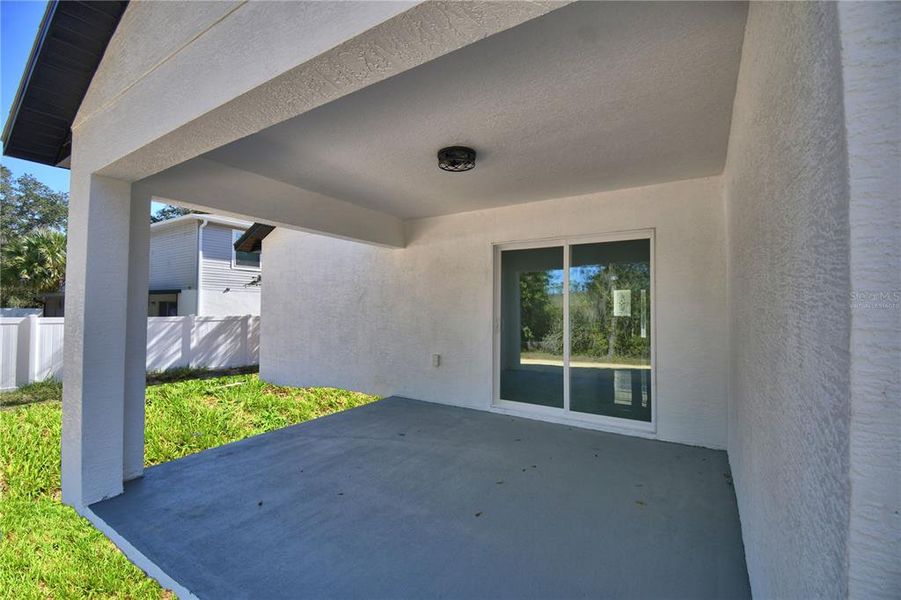 Exterior details and patio area of a home in , Poinciana (Image 3). Exterior details and patio area of a home in , Poinciana (Image 3).