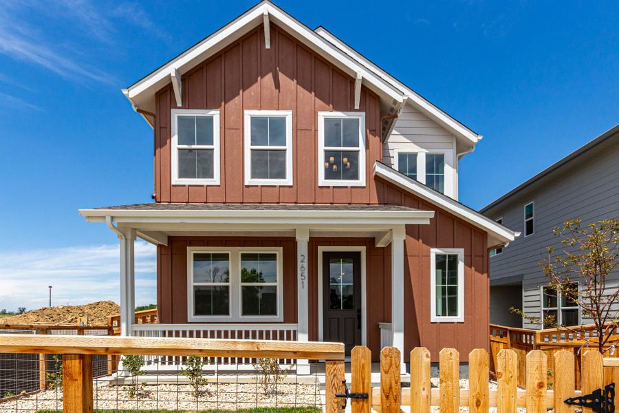 Front exterior of a new home in Arras Park, Thornton, CO, highlighting curb appeal (Image 2).
