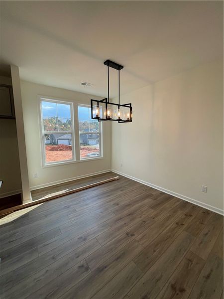 Spacious, unfurnished interior of a new home in Springwood Grove, Central (Image 11).