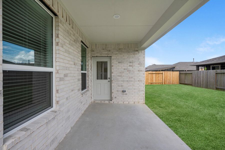 Exterior details and patio area of a home in Beacon Hill, Waller (Image 2). Exterior details and patio area of a home in Beacon Hill, Waller (Image 2).
