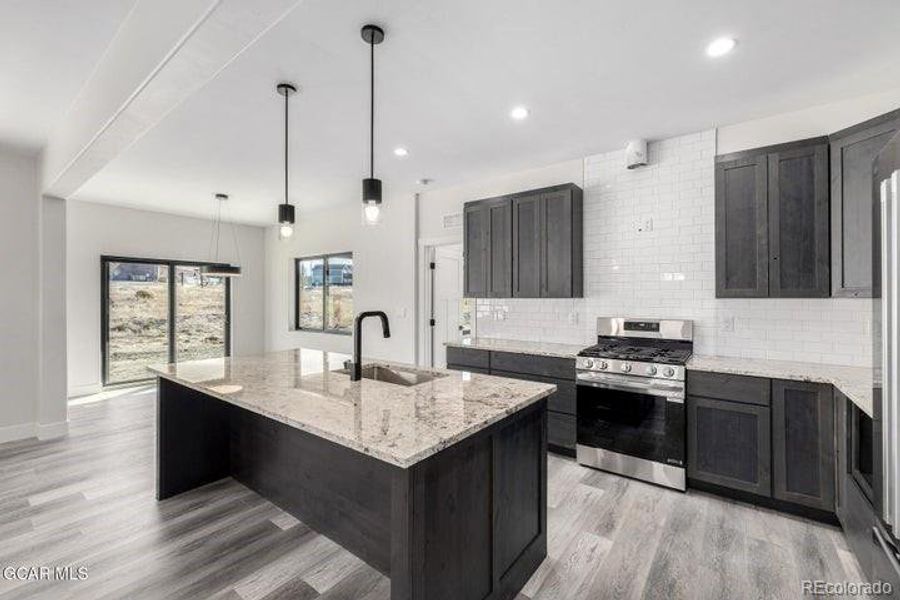 Furnished interior view inside a new home in , Granby (Image 9).