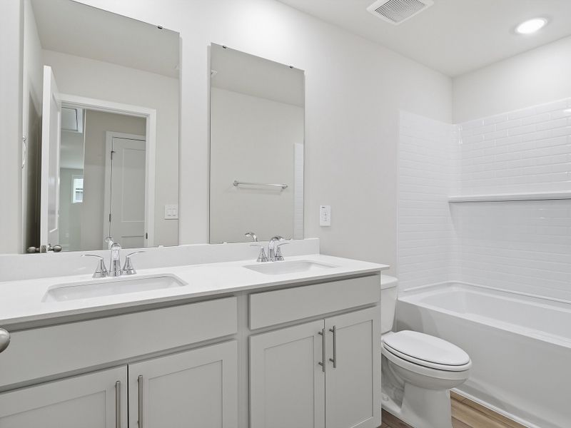Furnished interior view inside a new home in Avalon Place - Signature Series, Durham (Image 10). Furnished interior view inside a new home in Avalon Place - Signature Series, Durham (Image 10).