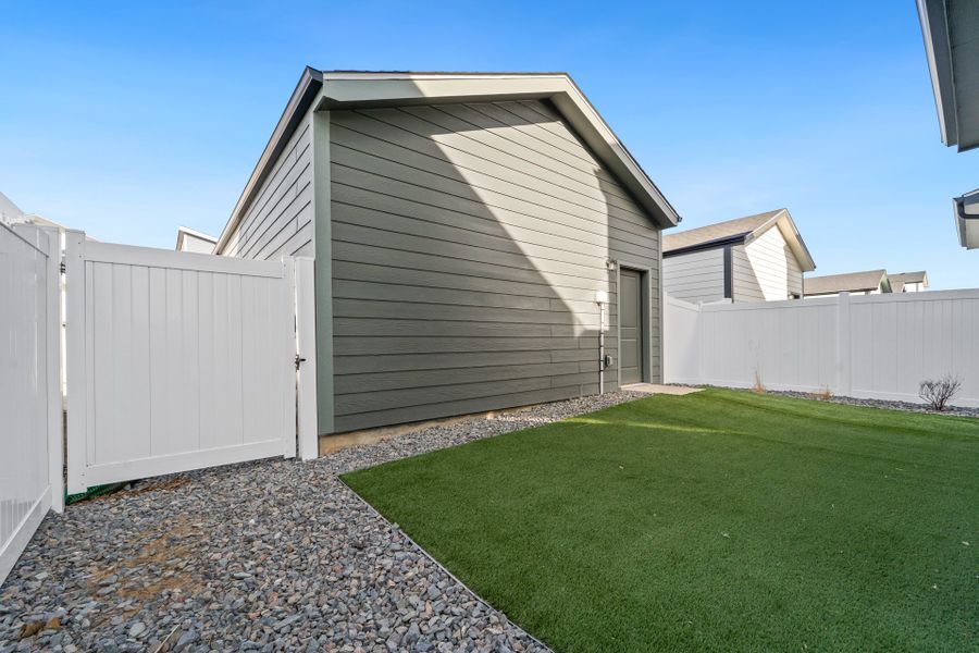 Representative exterior photo of a completed home built from the Telluride by Baessler Homes in Liberty Draw, Evans, CO (Image 28).