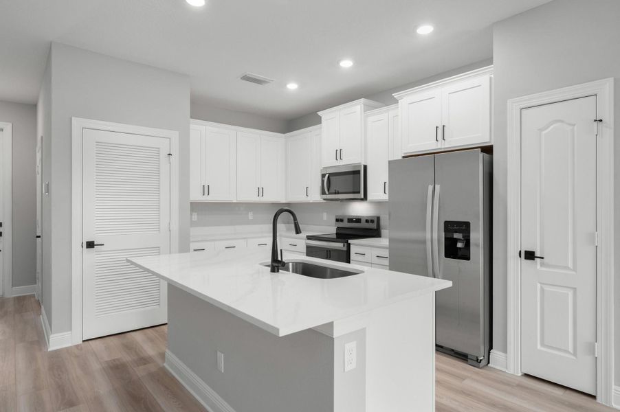 Furnished interior view inside a new home in Celebration Pointe, Fort Pierce (Image 3).