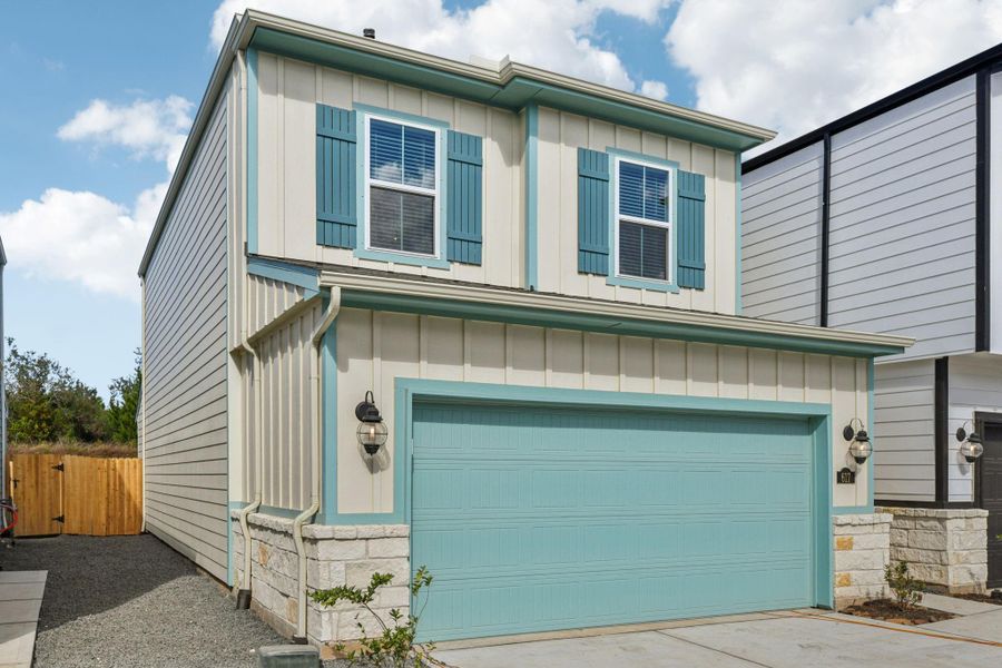 Front exterior of a new home in Kemah Crossing - City Series, Kemah, TX, highlighting curb appeal (Image 26).