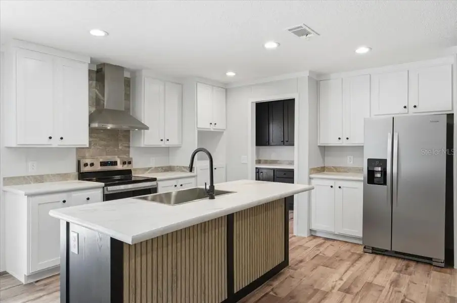 Furnished interior view inside a new home in , Zephyrhills (Image 4).