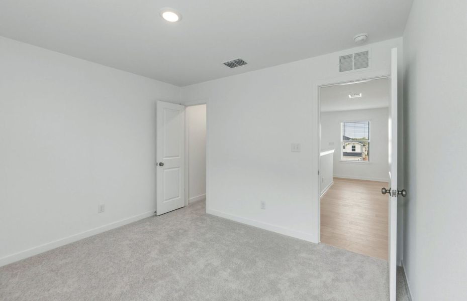 Spacious, unfurnished interior of a new home in Sunfield, Buda (Image 45). Spacious, unfurnished interior of a new home in Sunfield, Buda (Image 45).