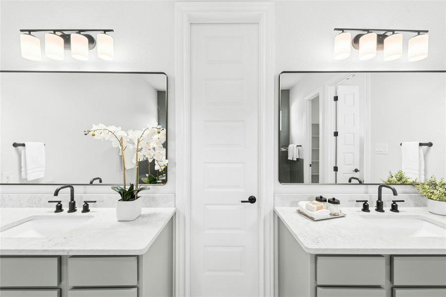 Full bath featuring two vanities Full bath featuring two vanities