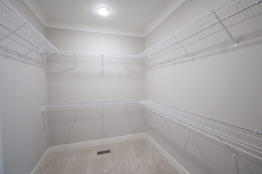 Spacious, unfurnished interior of a new home in Baker Road, Birchwood (Image 65).