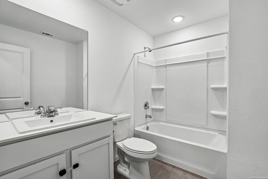 Furnished interior view inside a new home in , Seguin (Image 11).