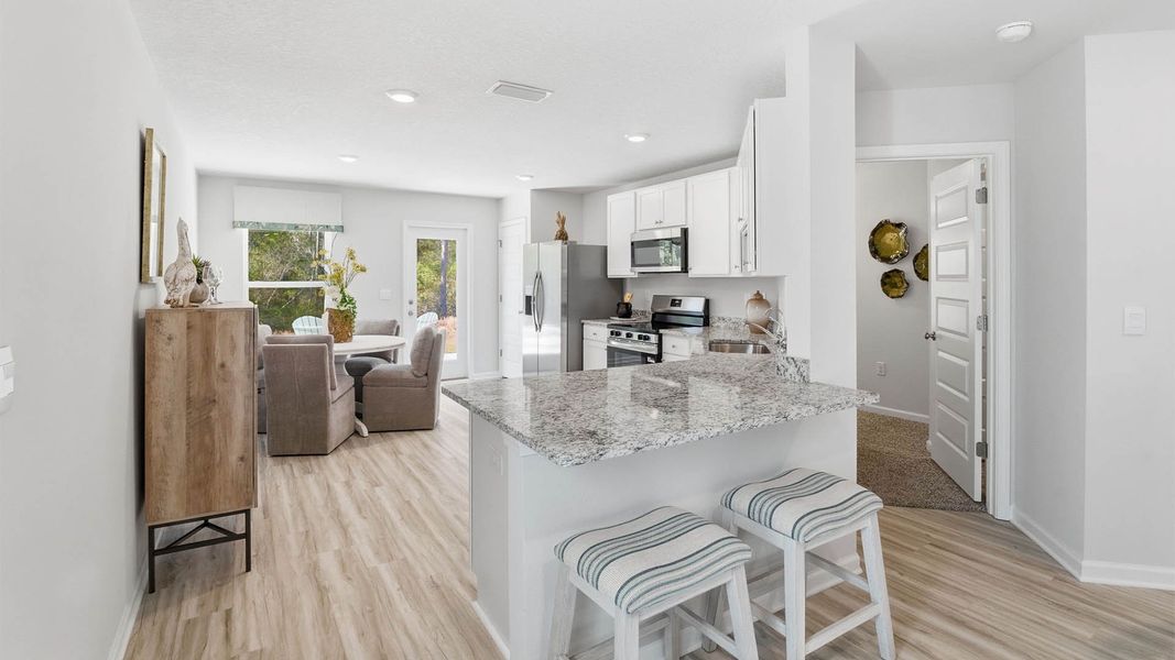 Furnished interior view inside a new home in Chateau Nemours, Port Saint Joe (Image 12).
