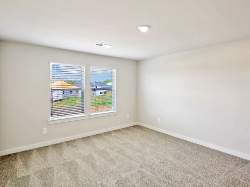 The primary suite offers a private retreat.