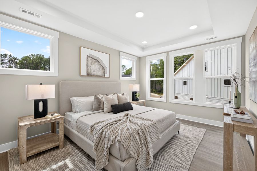 Representative furnished interior of a home built from the Weston End Unit by Baker Residential in Parc at Bradley Farm, Apex (Image 18).