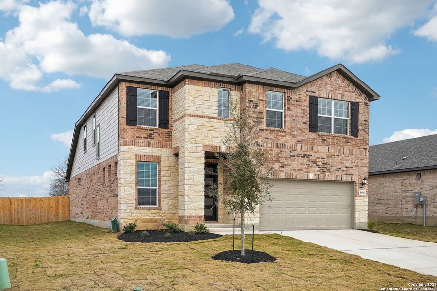 Front exterior of a new home in Carmel Ranch, Schertz, TX, highlighting curb appeal (Image 25).