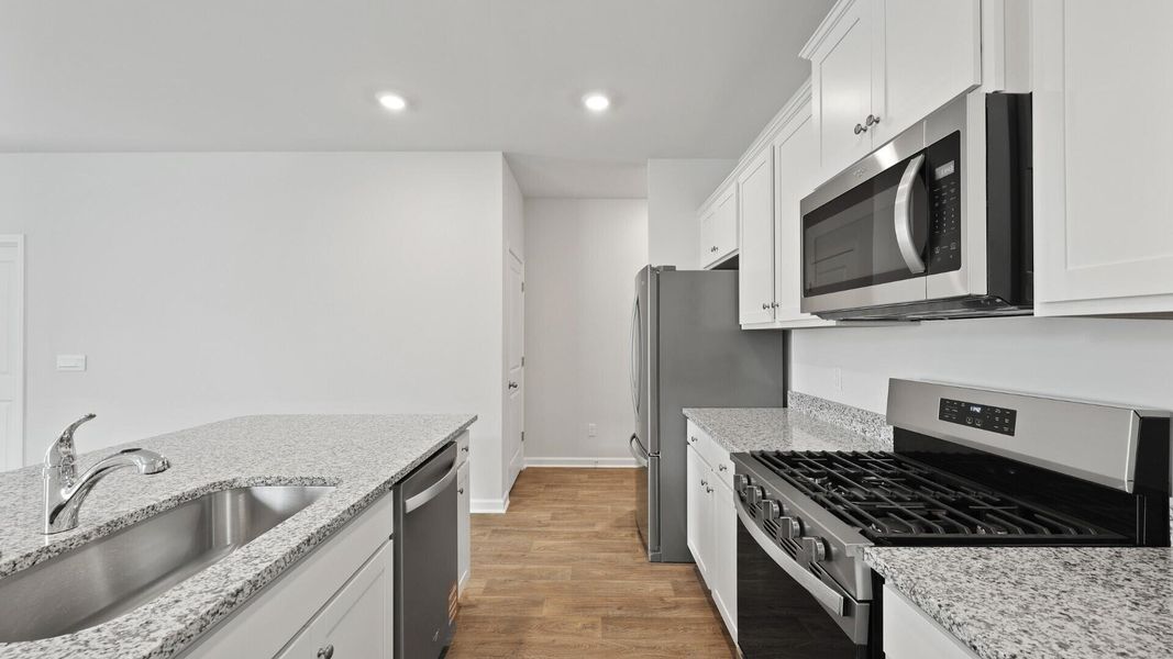 Furnished interior view inside a new home in Pine Hills at Cane Bay, Summerville (Image 6).