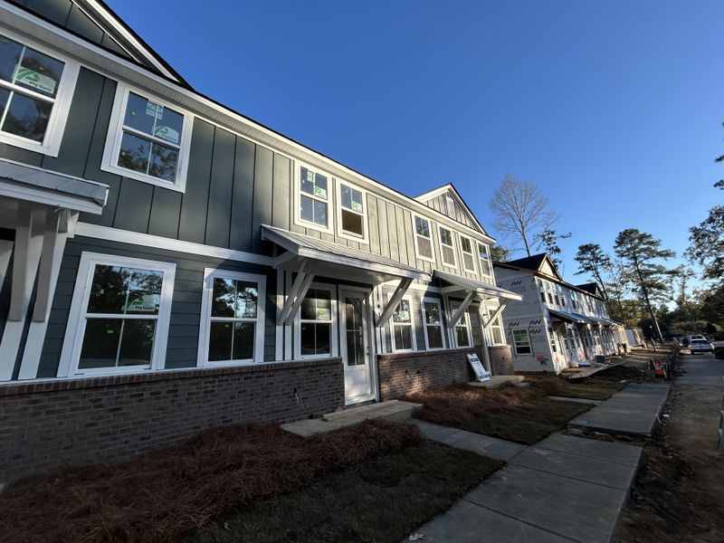 Exterior details and patio area of a home in Windward Village, Summerville (Image 2).