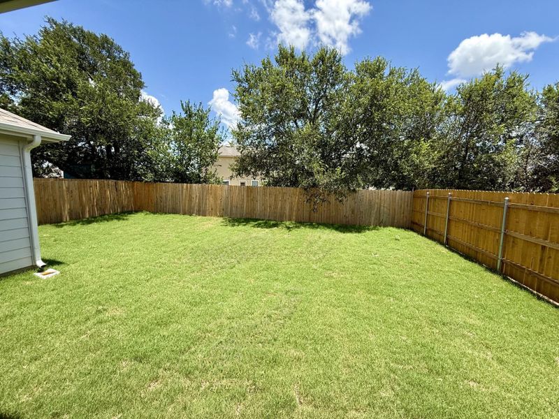 Exterior details and patio area of a home in Creeks Crossing, Elgin (Image 3).