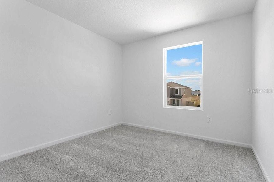Spacious, unfurnished interior of a new home in Peace Creek Reserve, Winter Haven (Image 17).