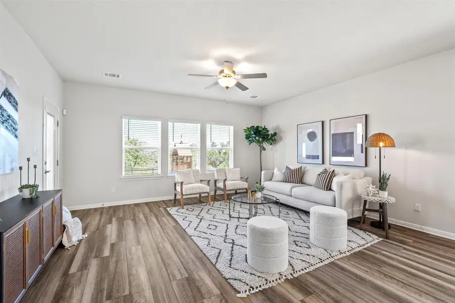 The large living room space is located directly off the kitchen. The large living room space is located directly off the kitchen.