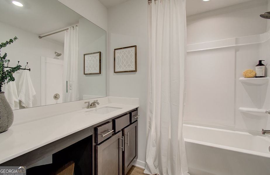 Furnished interior view inside a new home in The Towns at Auburn Station West, Auburn (Image 23).