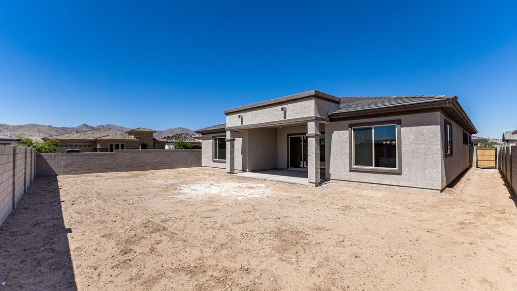 Exterior details and patio area of a home in Windrose, Waddell (Image 4).