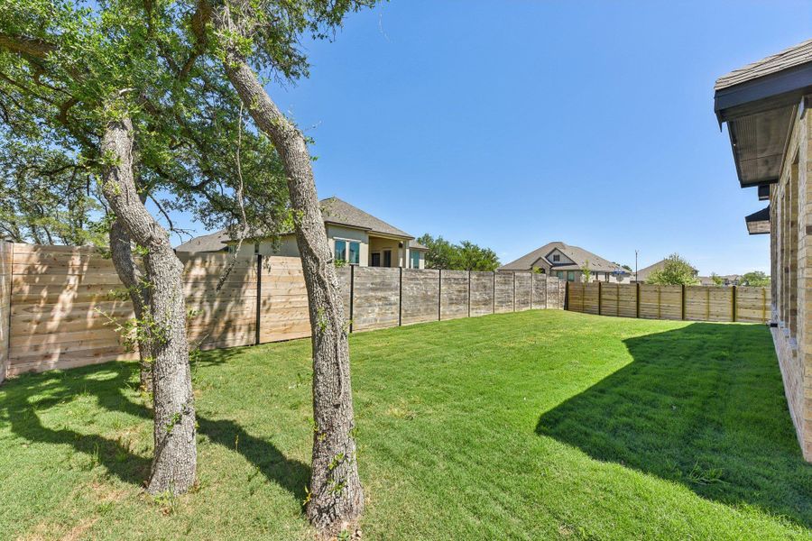 Exterior details and patio area of a home in Highland Village, Georgetown (Image 4).