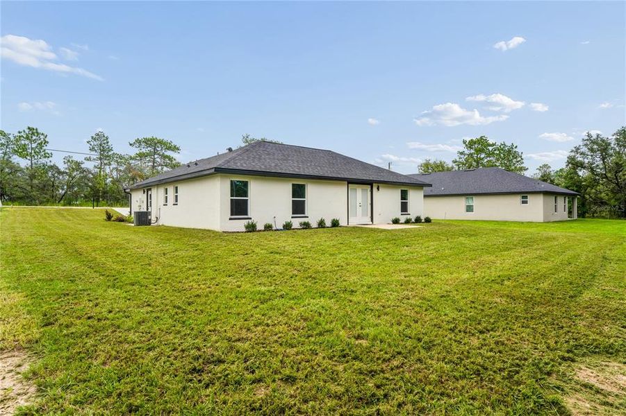 Exterior details and patio area of a home in , Brooksville (Image 31).