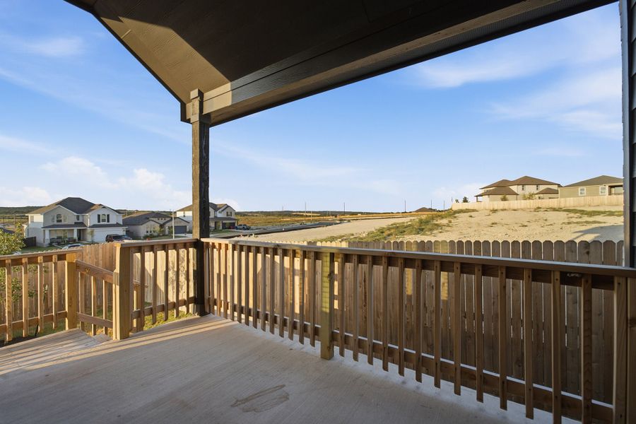 Exterior details and patio area of a home in The Woodlands at Medina Hills, Mico (Image 24).