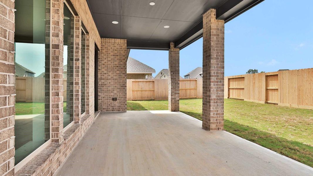 Exterior details and patio area of a home in Riceland, Mont Belvieu (Image 3).
